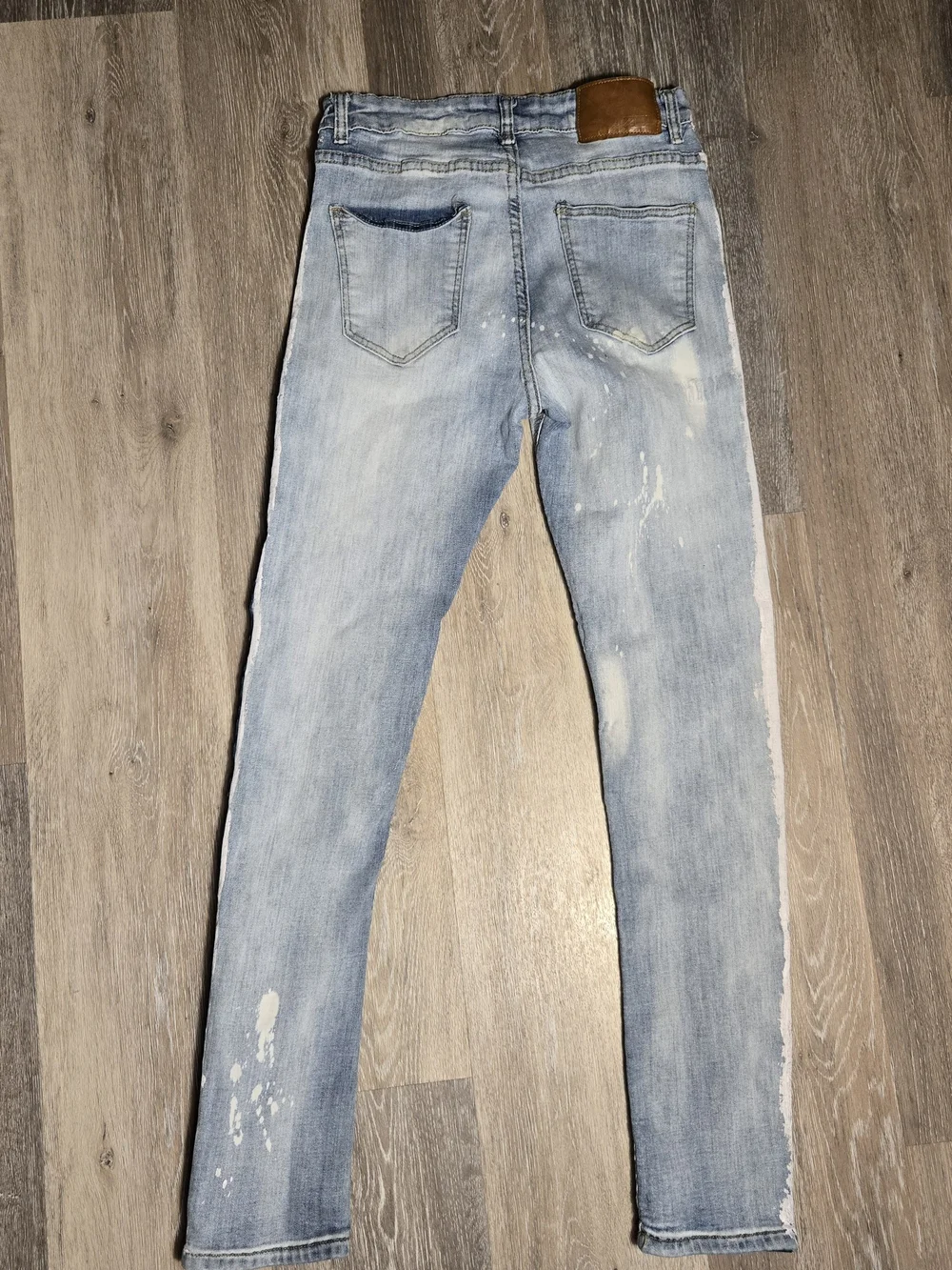 ZCL skinny fit blue distressed denim jeans featuring white paint 32x32
